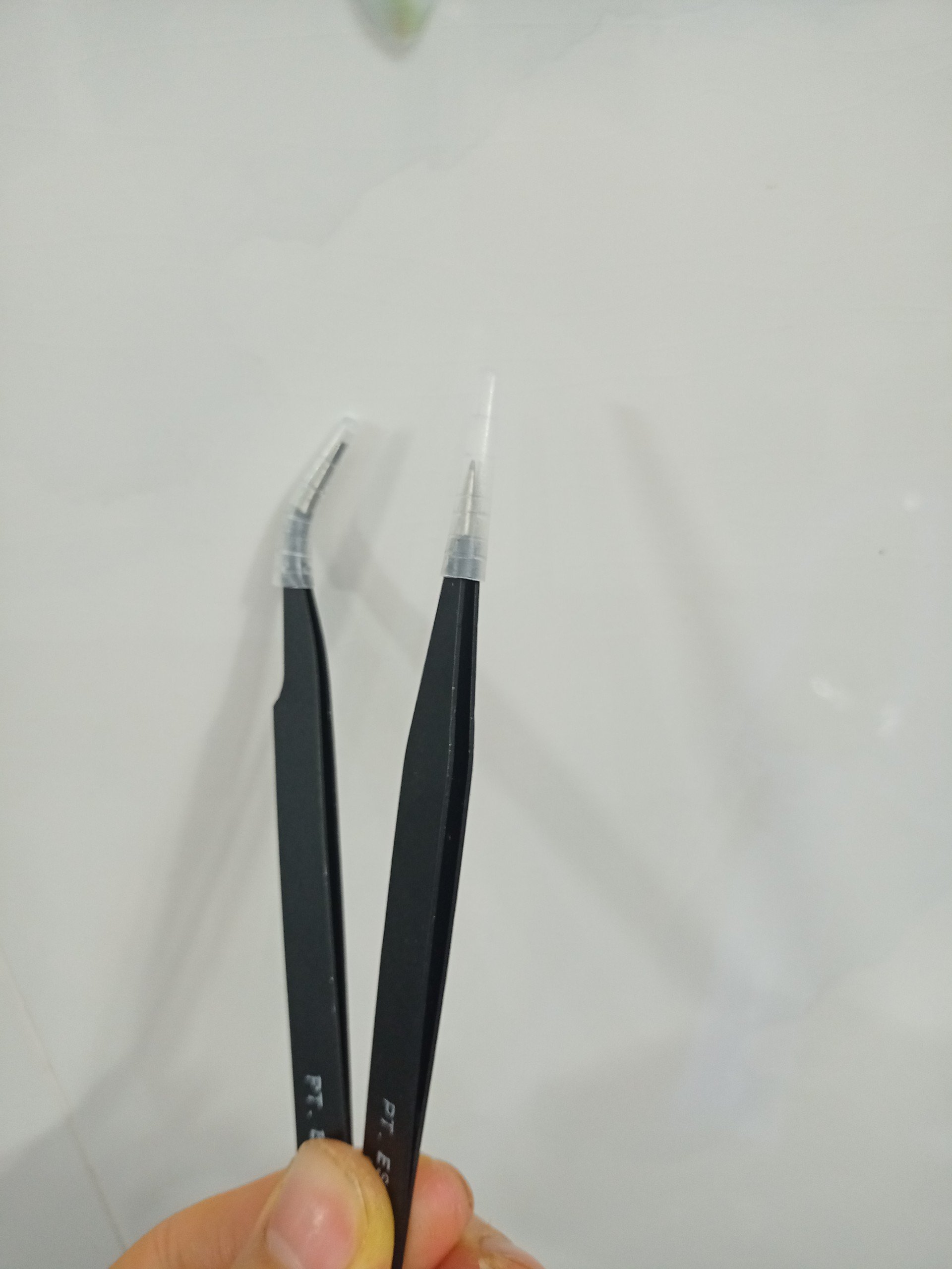 Nhíp cong inox HRC đen - phụ liệu tóc Thủ Đức
