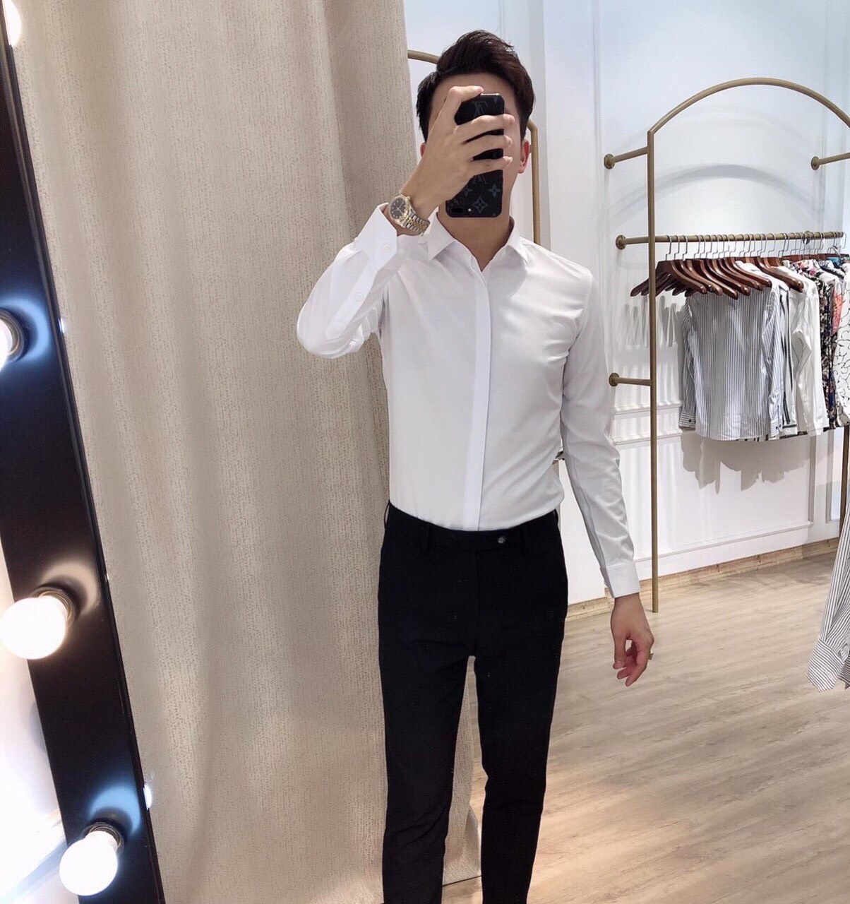 Áo sơ mi nam trơn dài tay dấu cúc