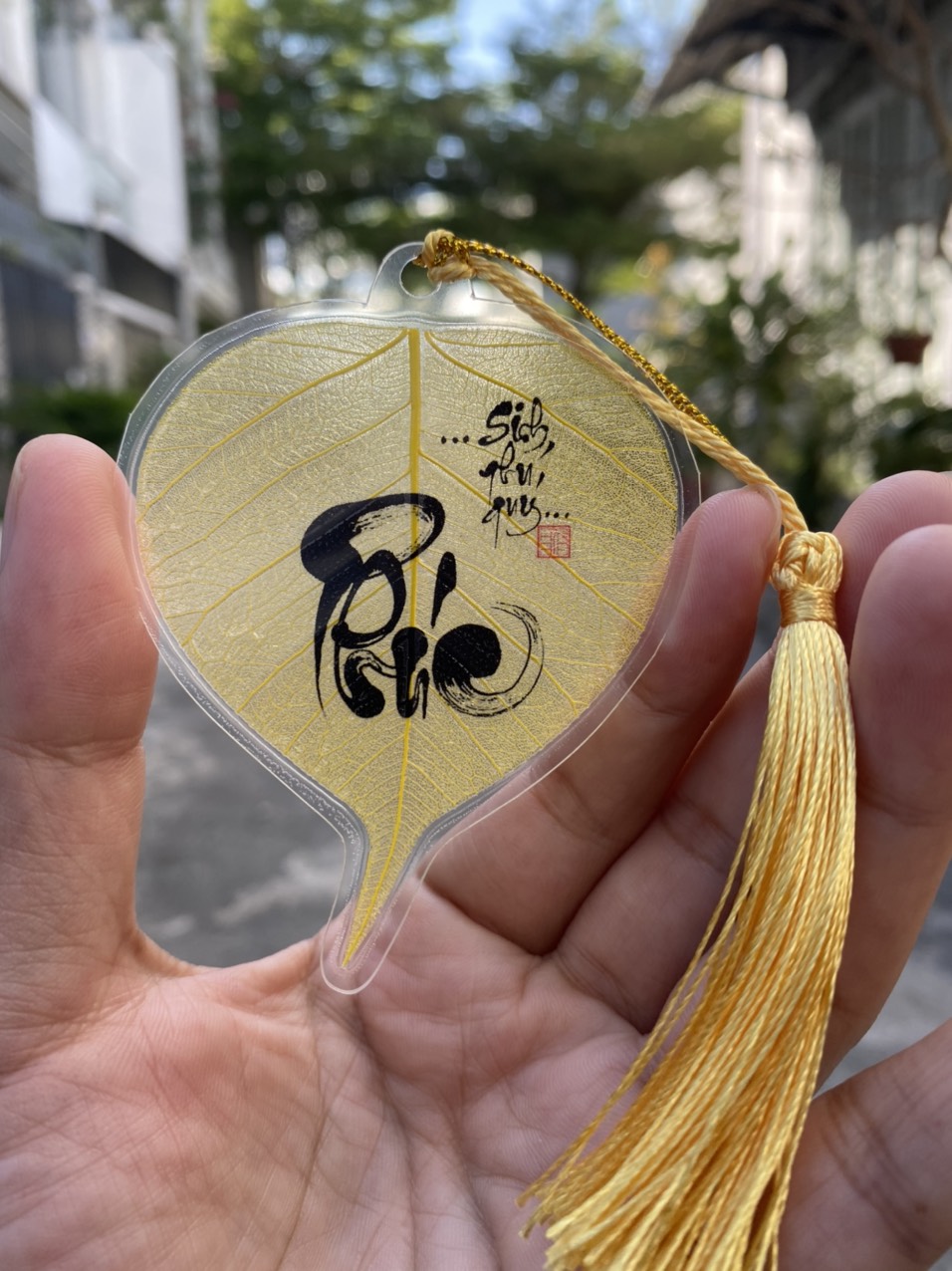 Lá bồ đề in chữ PHÚC SINH PHÚ QUÝ
