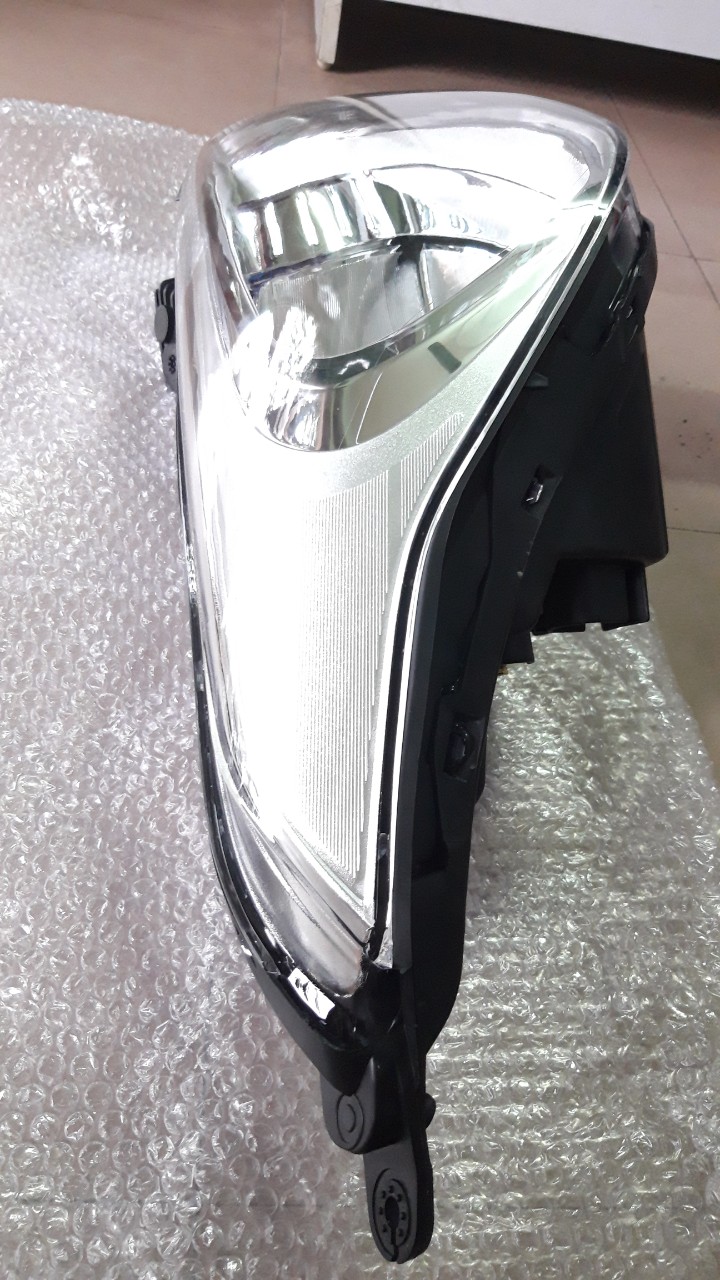 Đèn pha Grand I10 (Có dù che bóng đèn, Phân vế ) OEM