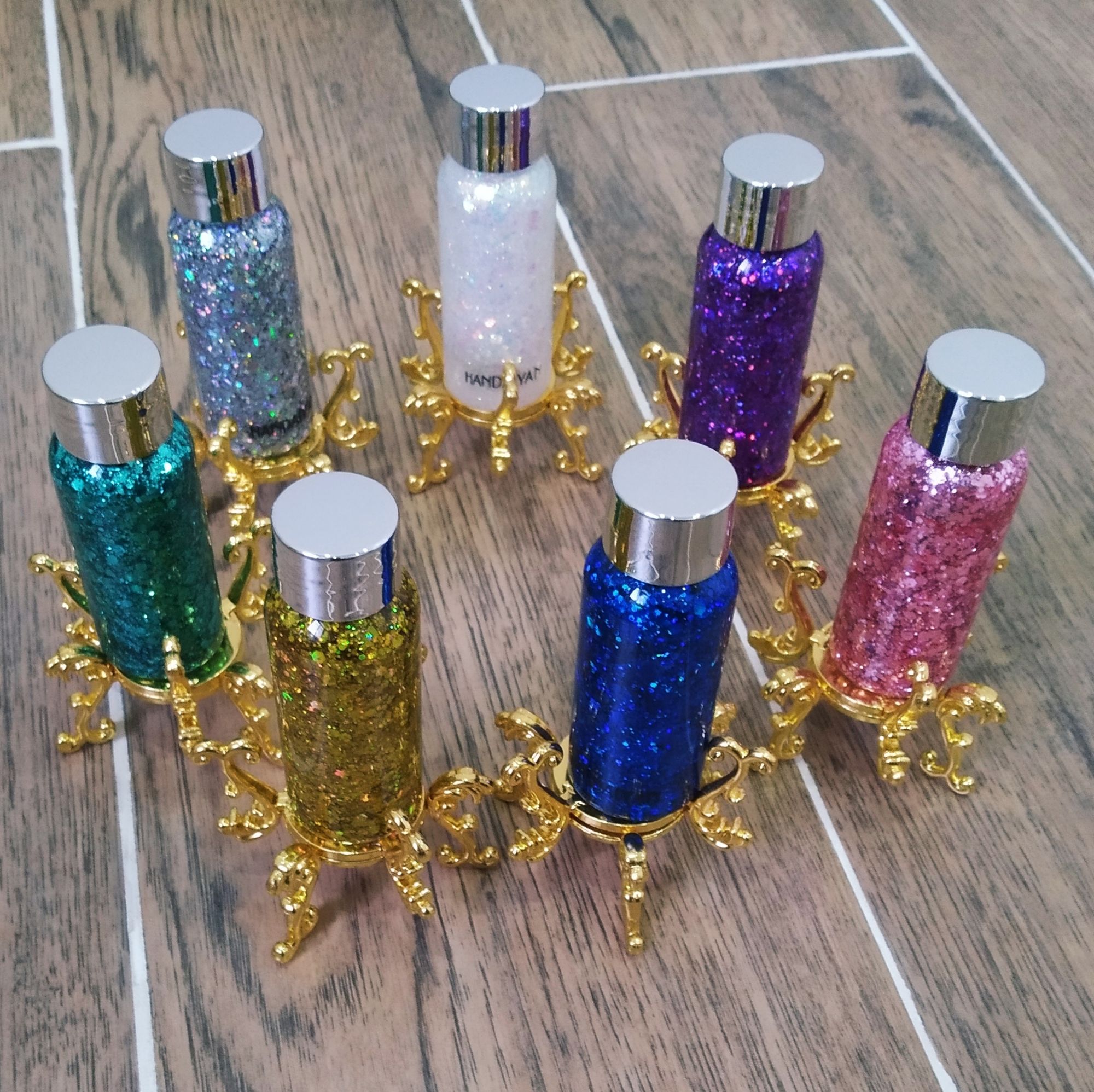 (Ngẫu nhiên màu sắc) 1 Bộ gồm 1đế như hình ảnh 1chai gel Kim xa nhũ trang Điểm Mặt,môi khi đi dạ hội,