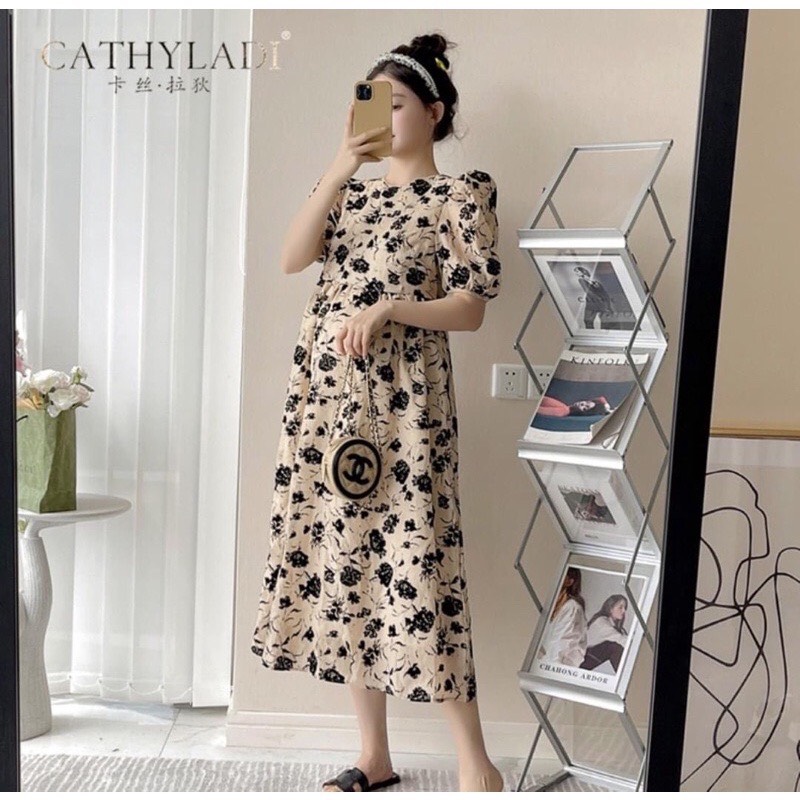 Đầm bầu công sở phối hoa đen dáng xòe