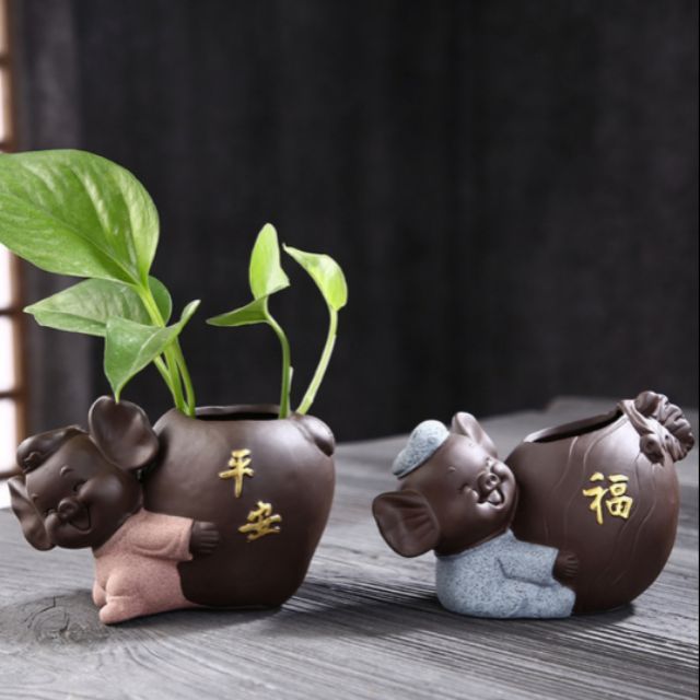 Tượng heo ôm chậu- tượng trang trí- tượng gốm đẹp