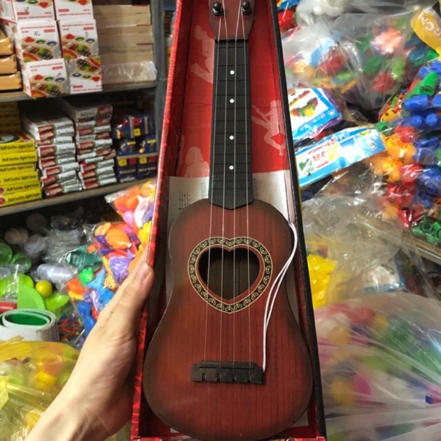 Đàn ghita nhựa giả gỗ