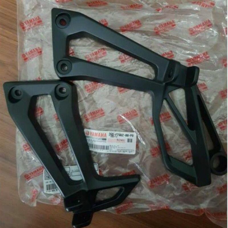 Báng để chân sau xe Exciter 150 sịn