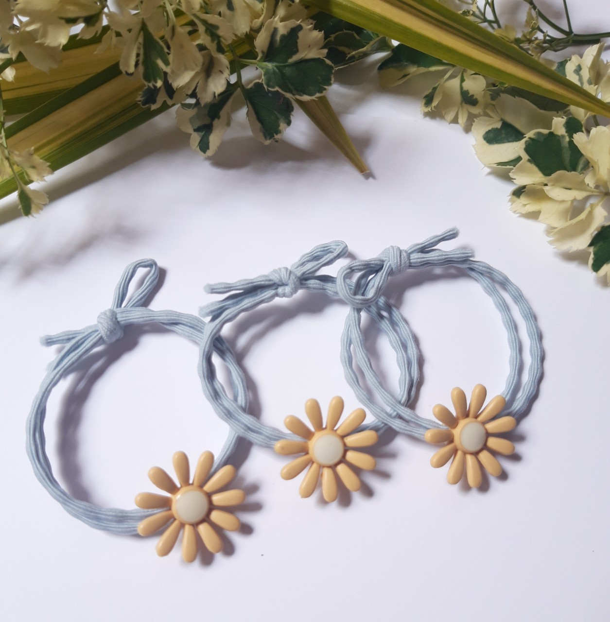 Cột tóc hoa cúc xinh xắn .( Cột siêu bền, hình ảnh thật)
