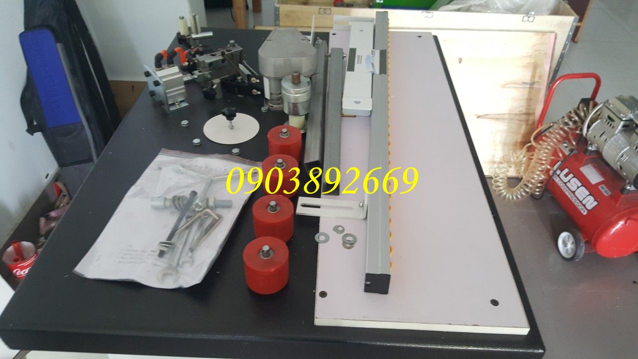 [HCM]máy dán cạnh viền tranh ảnh