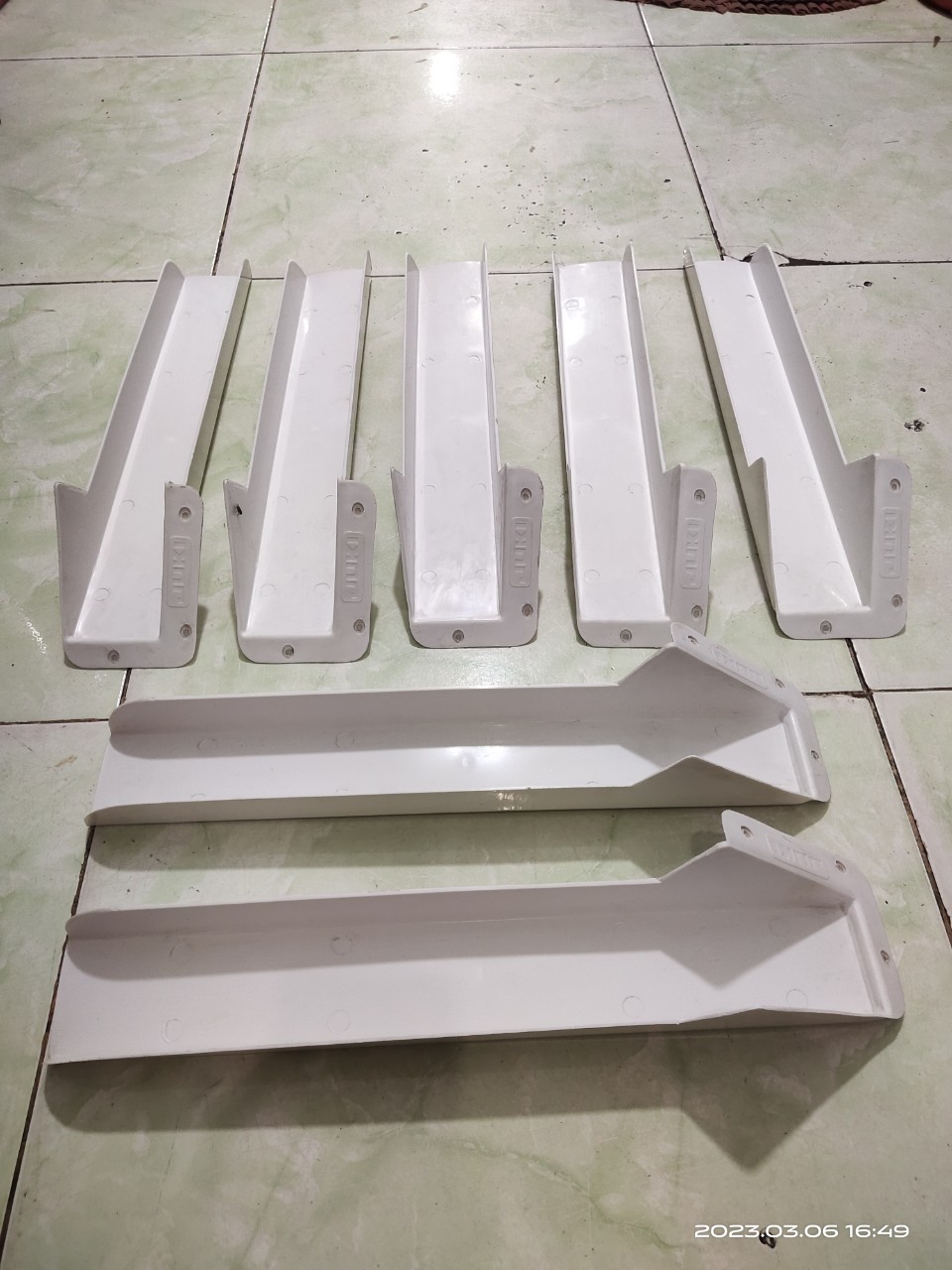 Máng thu nhận rác máy vắt sổ