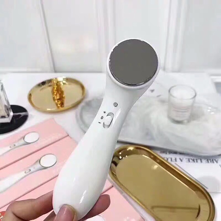 Máy massage mặt mini cầm tay