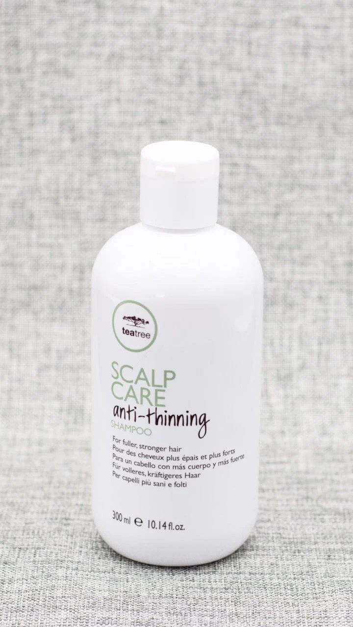 Dầu Gội Kích Thích Mọc Tóc Tea Tree Scalp Care Anti Thinning