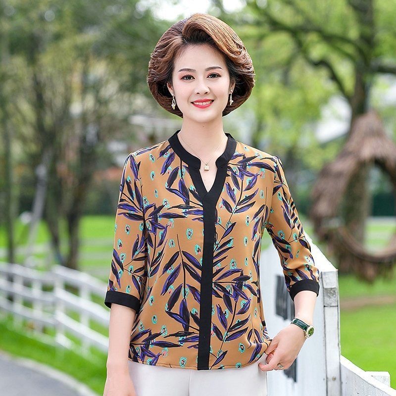 ÁO TRUNG NIÊN NỮ TAY LỠ HOA LÁ