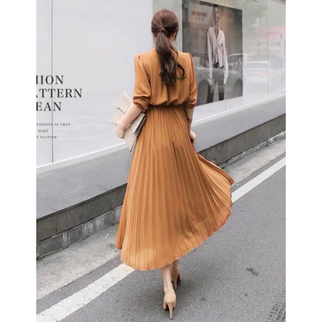 Đầm vàng đồng cổ trụ tùng dập li