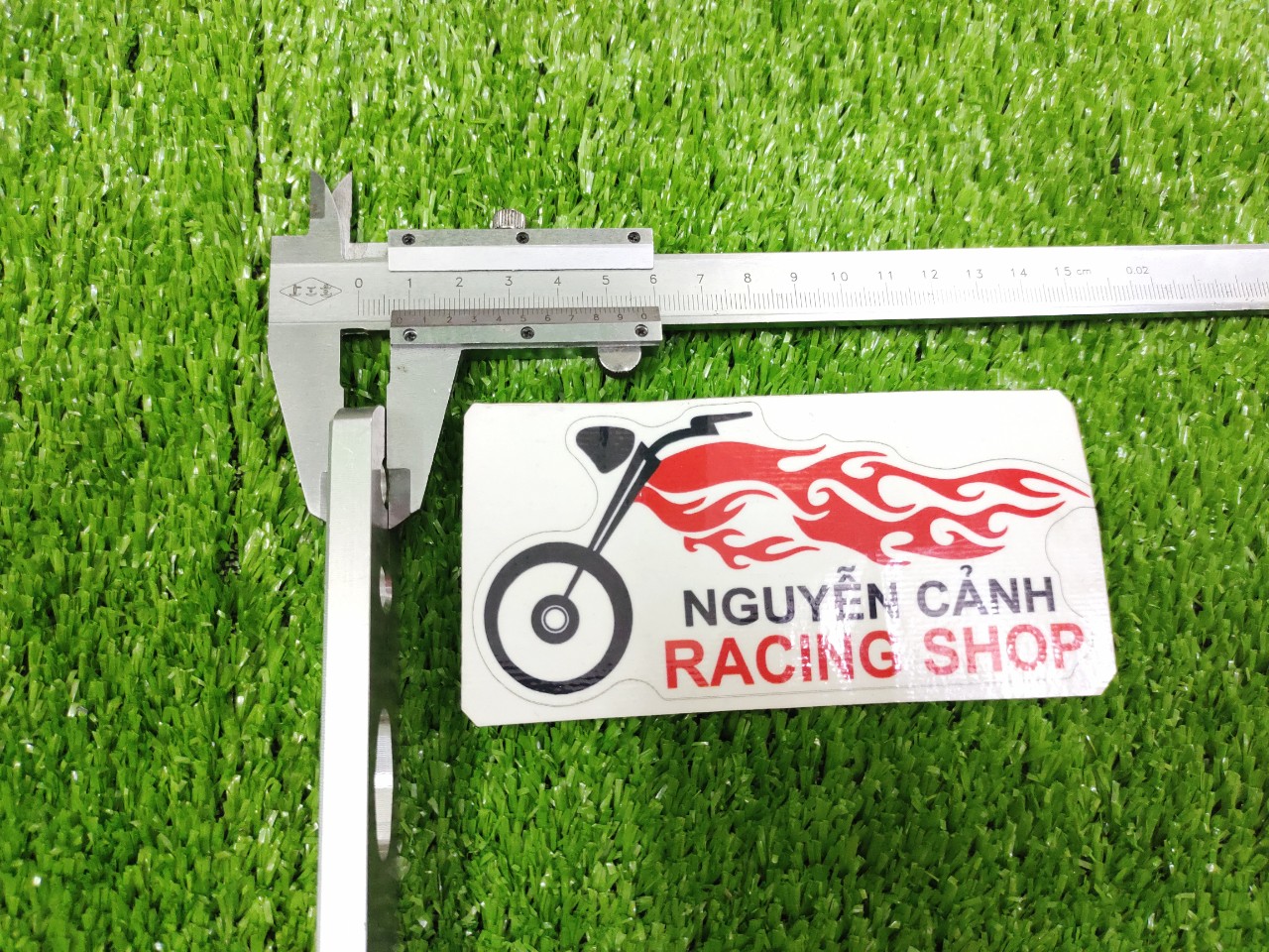PAS nhôm chế treo pô cho xe máy