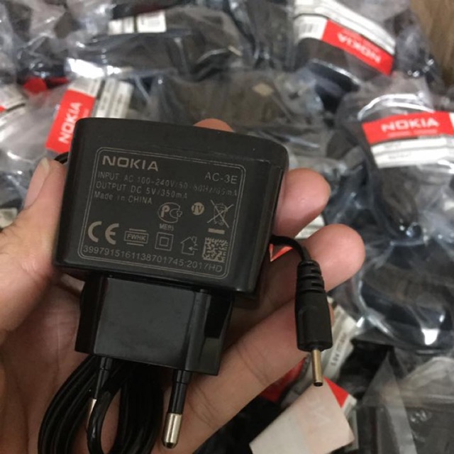 Sạc Nokia Zin chân kim ,Sạc xịn có dòng chữ NOKIA trên cục sạc ( lưu ý loại 2 chỉ có NOK )