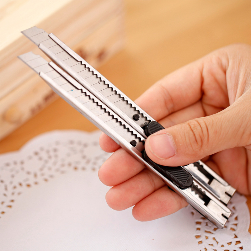 Dao dọc giấy Cutter