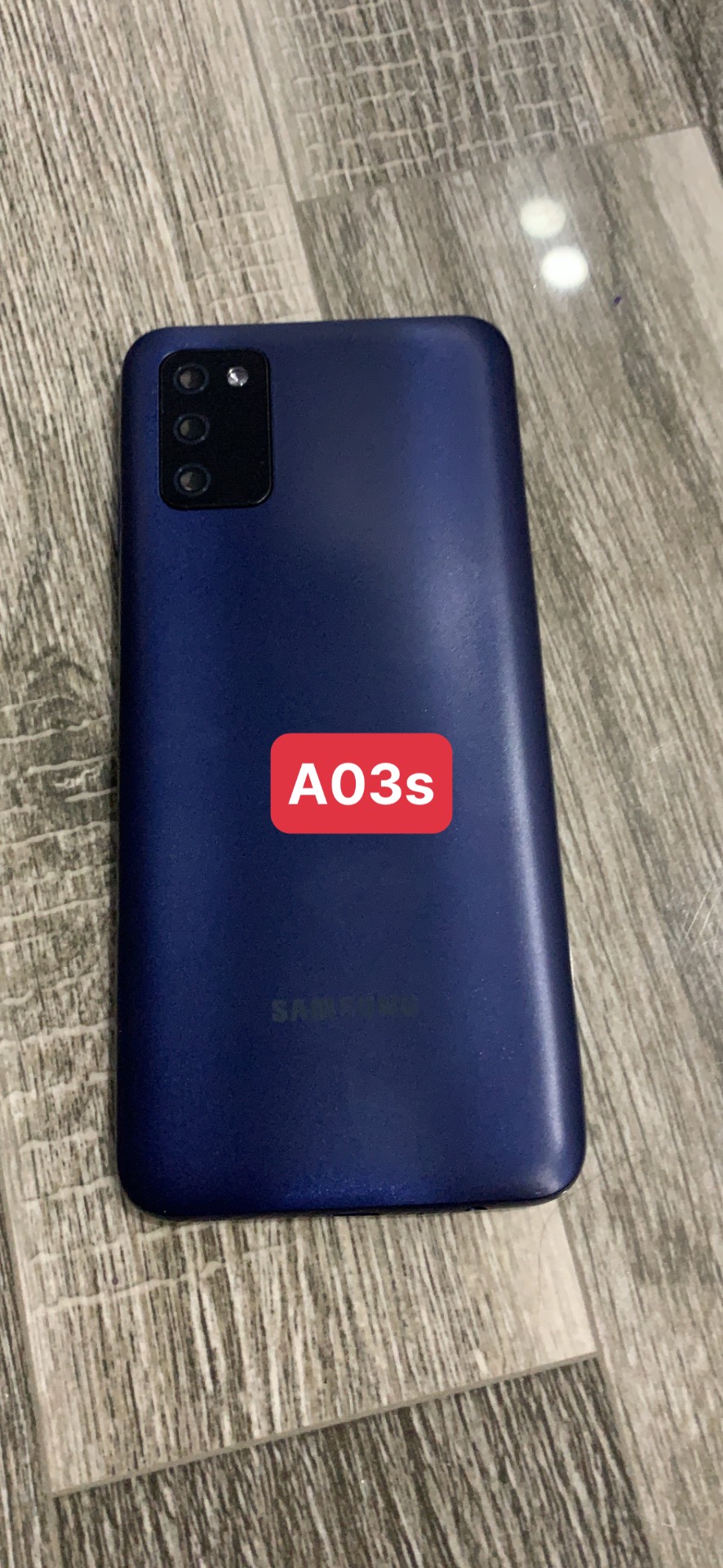 bộ vỏ samsung A03S (gồm,sườn,lưng,kính cam, nút bấn)