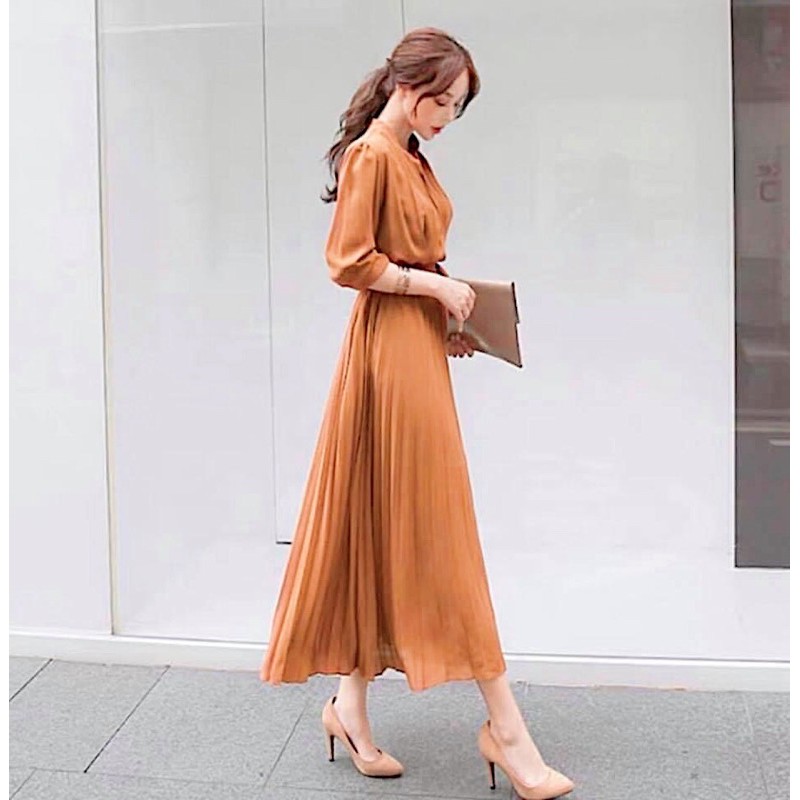 Đầm vàng đồng cổ trụ tùng dập li
