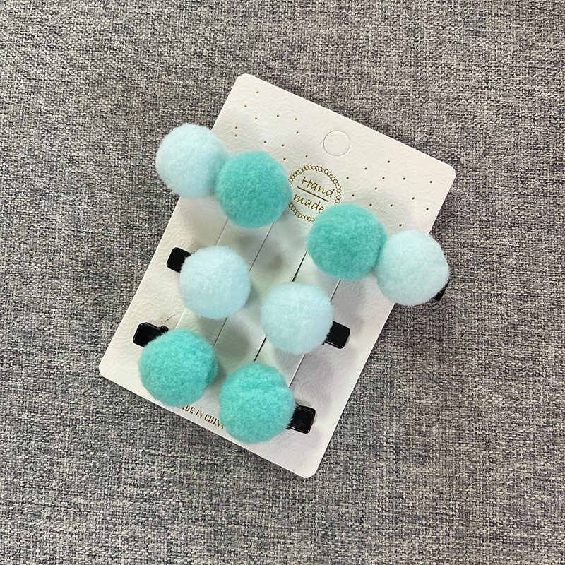 set 2 kẹp tóc pon pon cho bé .