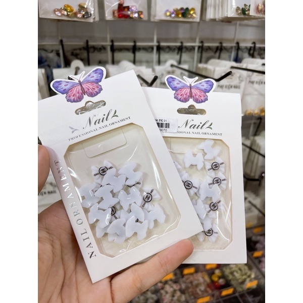 Set charm nơ đính móng đen trắng nail