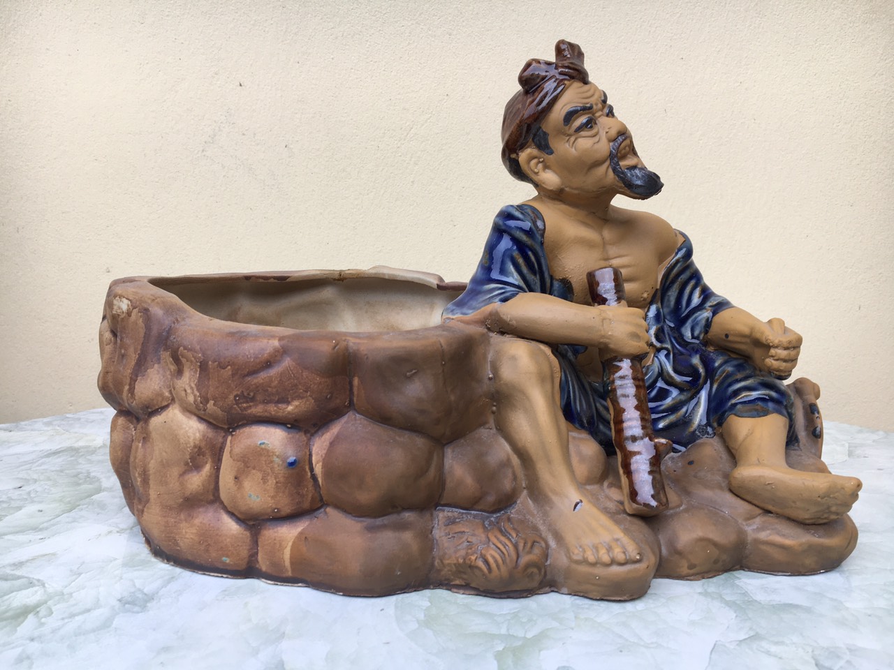 Chậu tượng ông lão nông