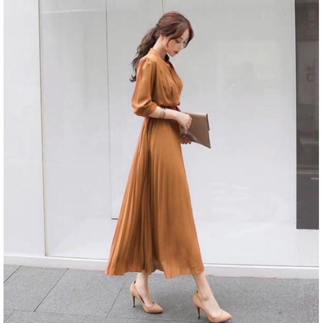Đầm vàng đồng cổ trụ tùng dập li