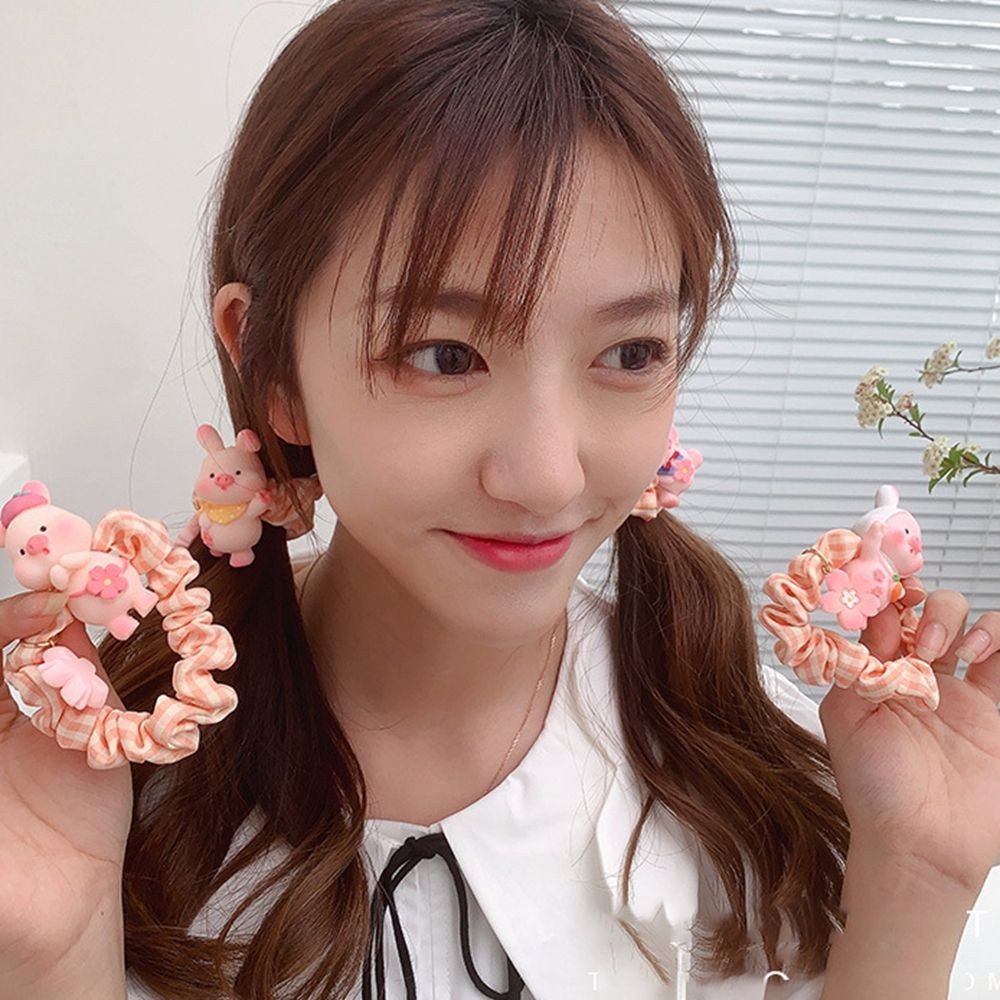 CỘT TÓC HEO HỒNG  TIỂU THƯ