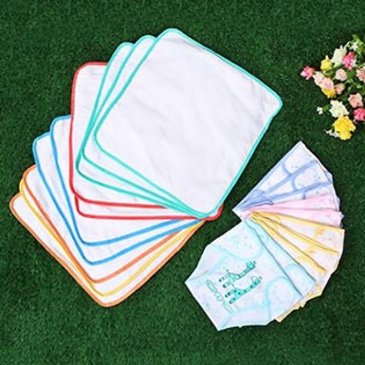 Combo 10 tã hoạt hình + 10 khăn lót chống thấm cho bé sơ sinh đến 9 ký