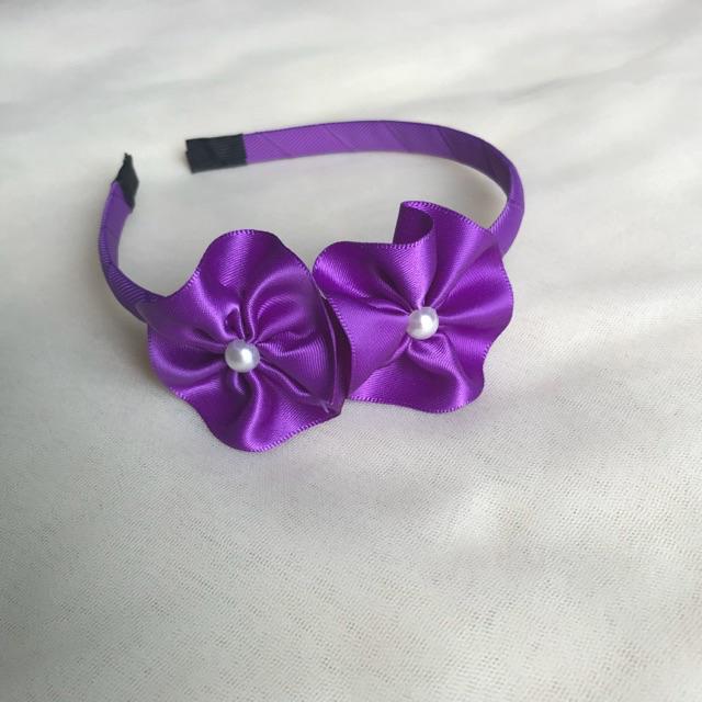 Cài tóc nơ đáng yêu cho bé gái