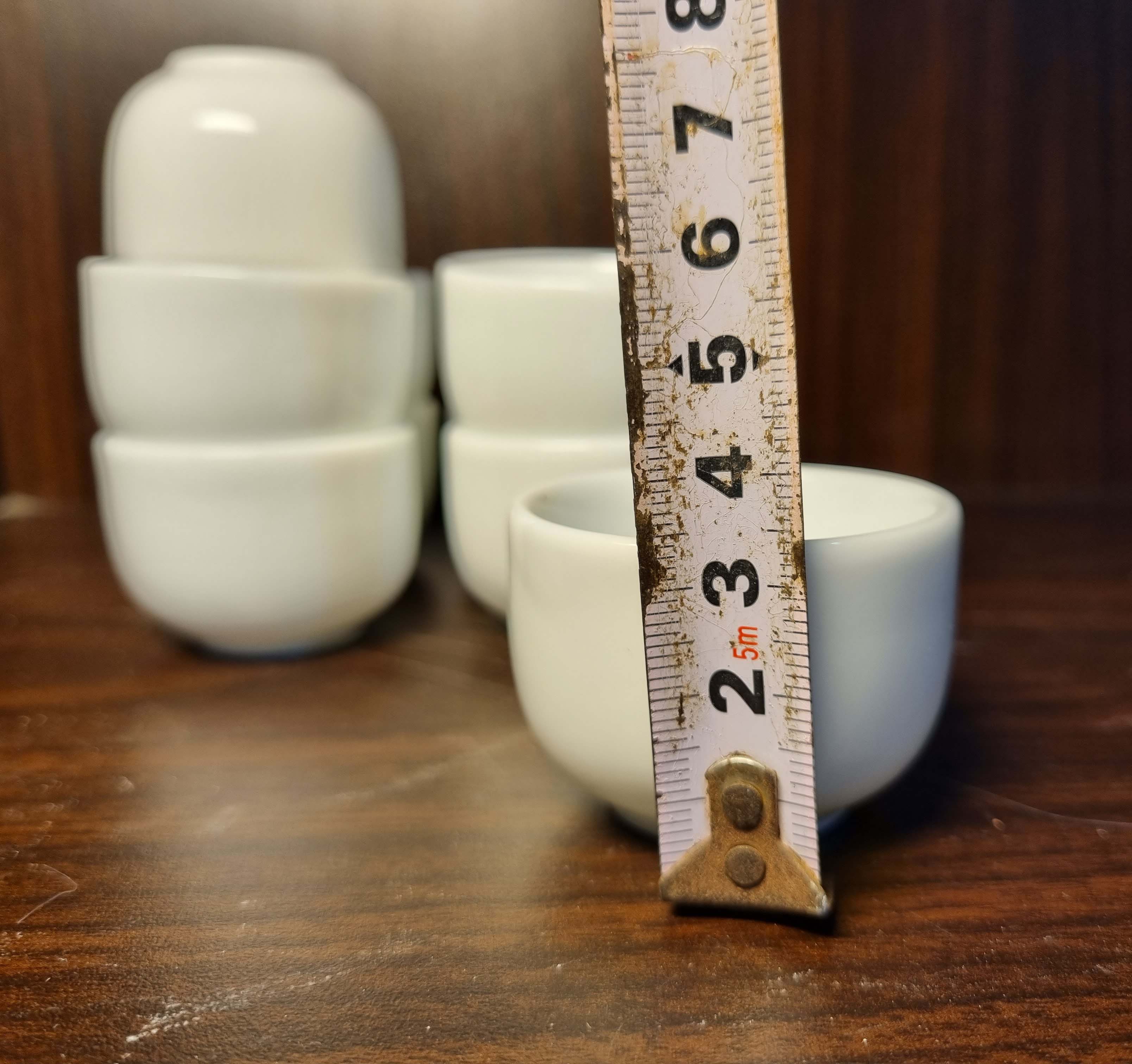 12 chén tửu (ly, tách) nhỏ, (chén/ly mít, mắt trâu), dùng để uống tửu