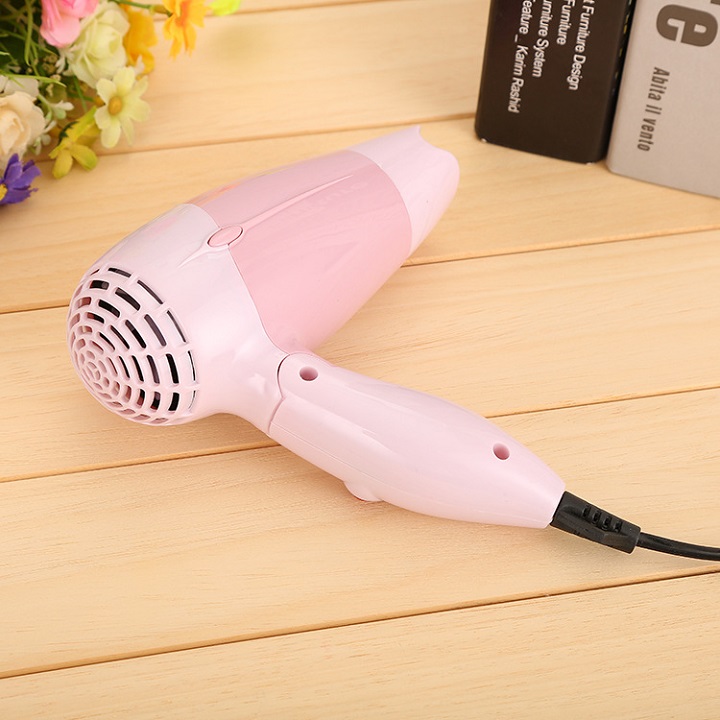 Máy sấy tóc mini tặng lược trong tạo kiểu tóc