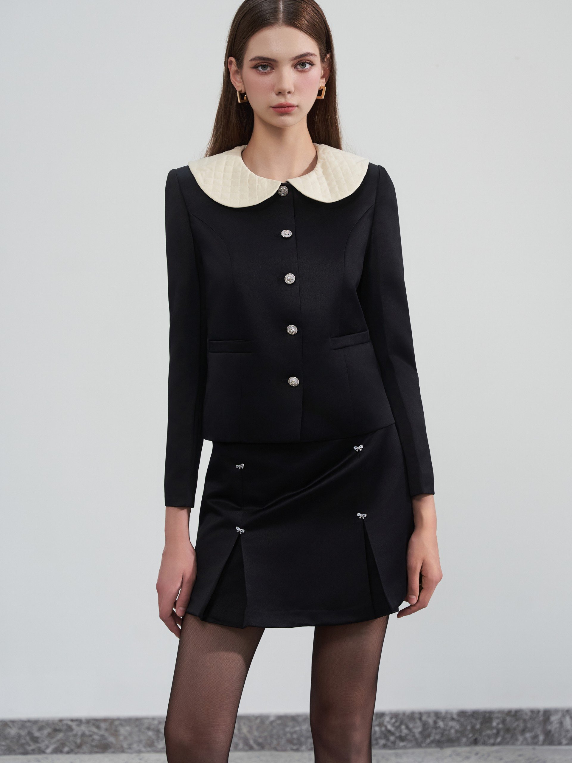 D.CHIC Chân váy A ngắn 4 cúc nơ MS: 381727