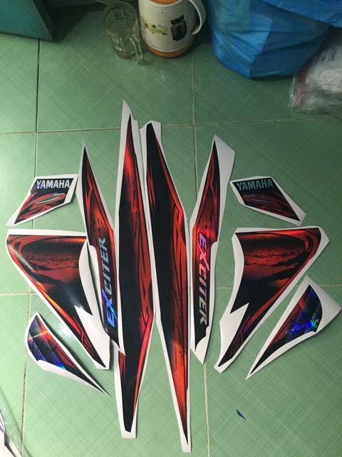 Tem exciter 2010 đỏ đen crom