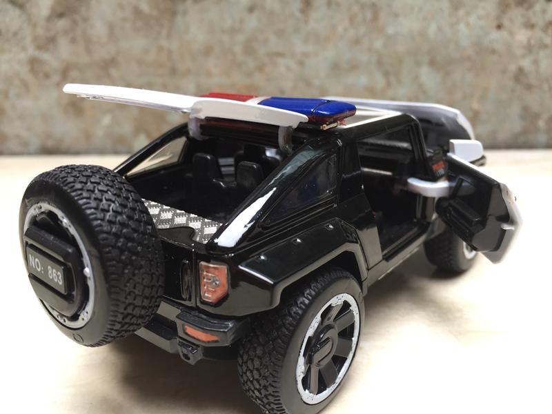 [HCM]Mô hình xe Cảnh.sát Hummer HX 1:32