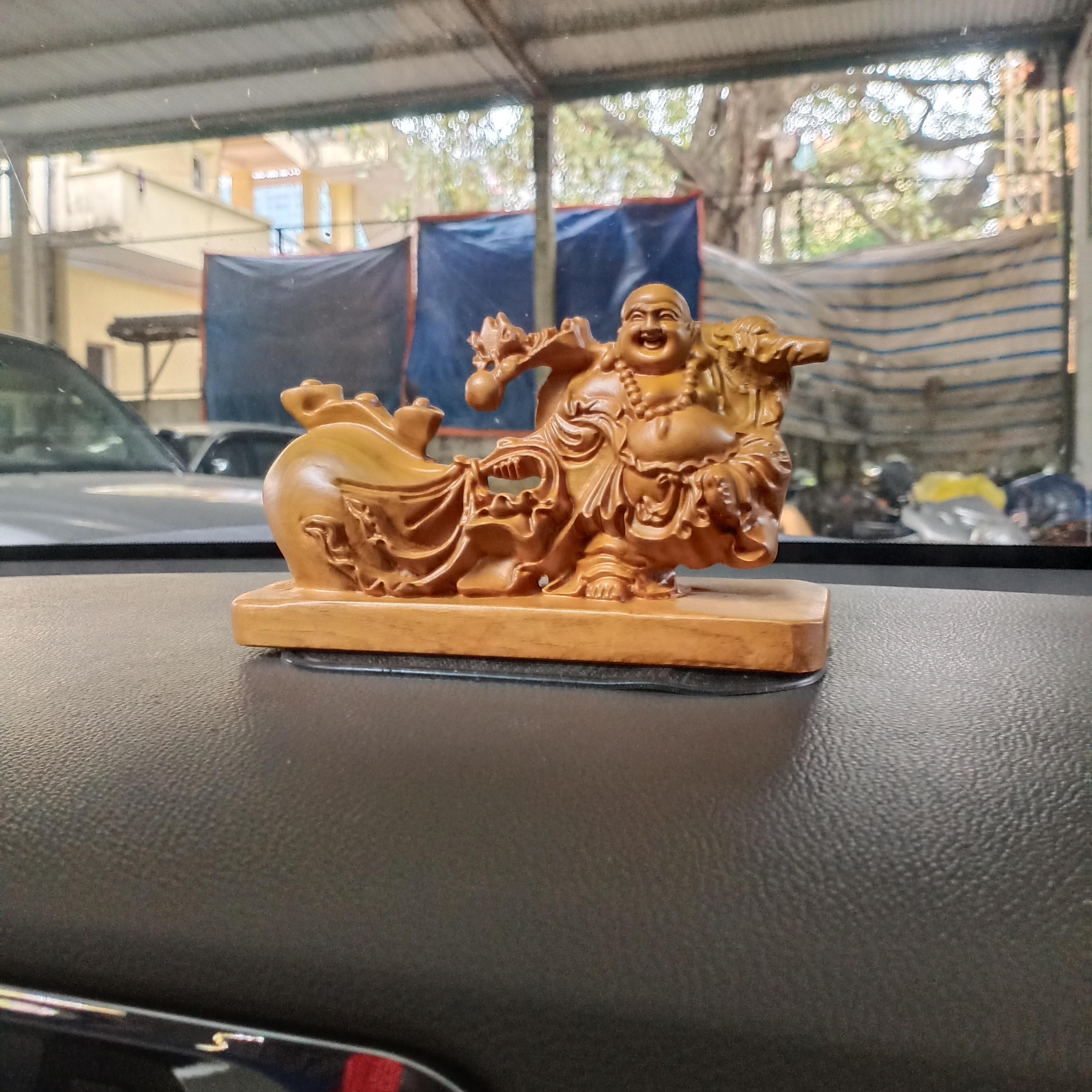 Tượng phật di lặc kéo bao tiền