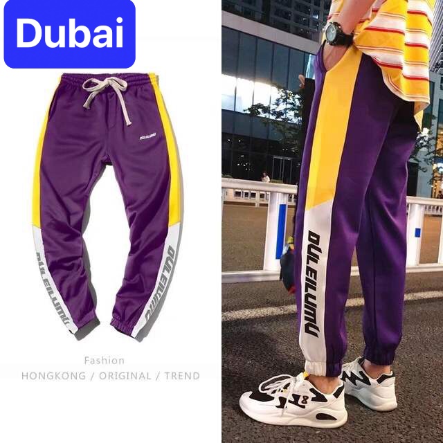 QUẦN JOGGER THỂ THAO NAM NỮ TÍM SỌC VÀNG CHỮ NHẬT BẢN SIÊU HOT TRÊN ĐÙI CHẤT NỈ DÀY DA CÁ CAO CẤP - DUBAI FASHION