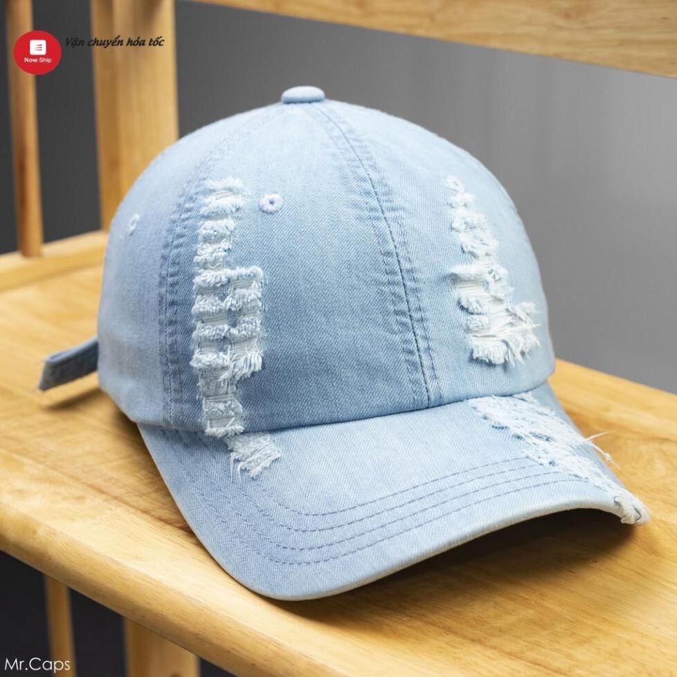 Nón kết jeans rách tưa màu xanh bụi bặm