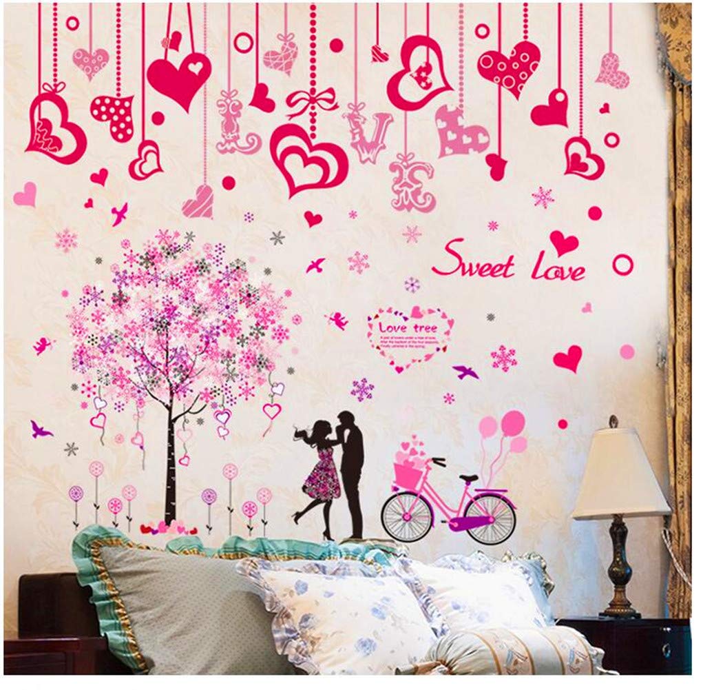 Decal dán tường dây leo trái tim và cặp đôi xe đạp