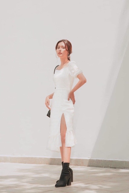 Đầm trắng đuôi cá xẻ tà