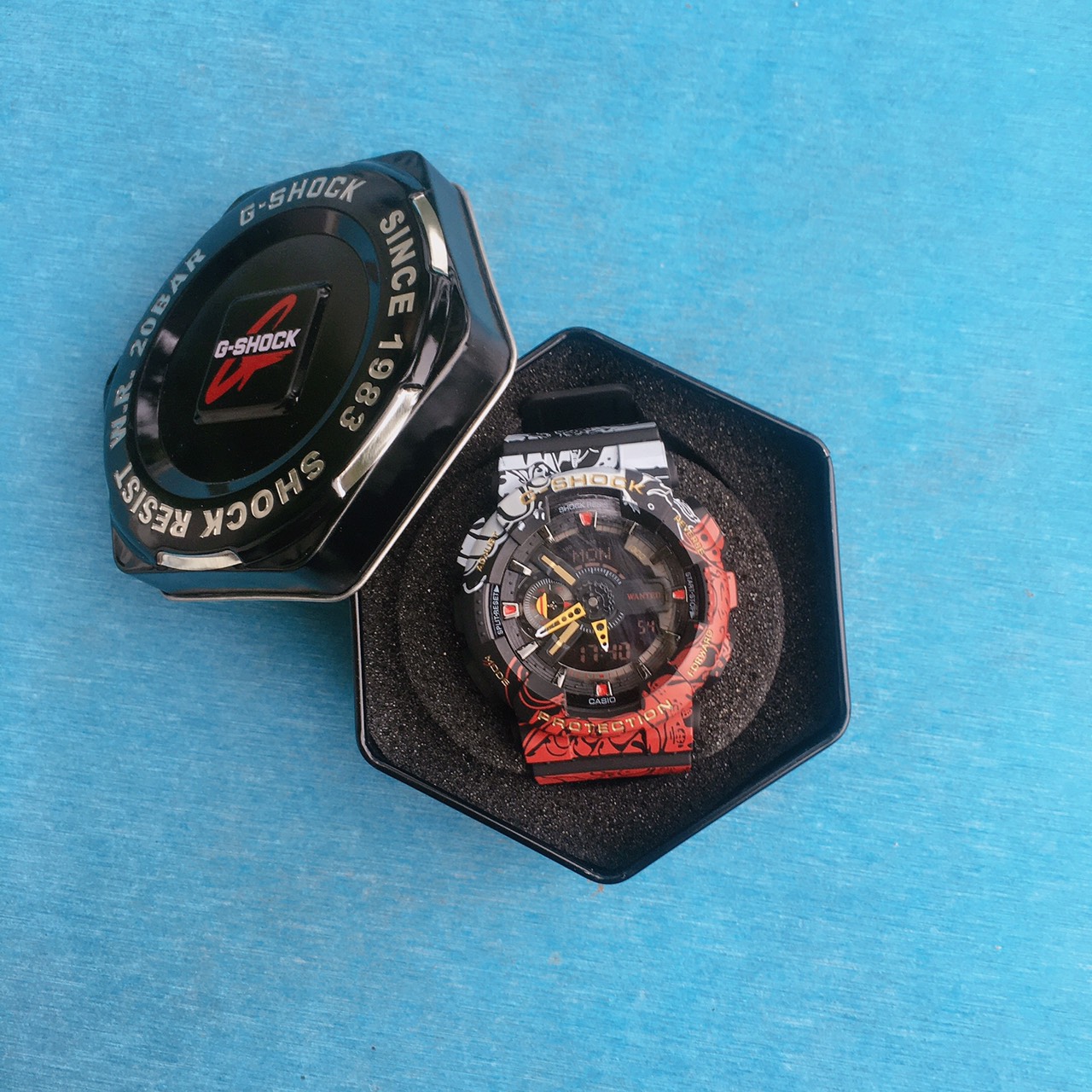 Hộp thiếc lục giác đồng hồ G-SHOCK