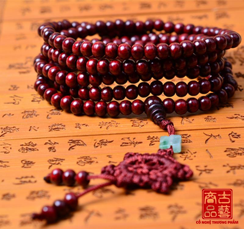 Vòng tay gỗ Tử Đàn 216 hạt (có tua rua bánh xe Pháp Luân)
