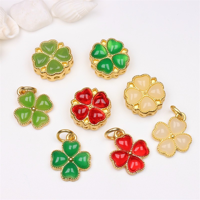 Vòng tay 108 hạt Trầm Tốc mix charm cỏ 4 lá may mắn