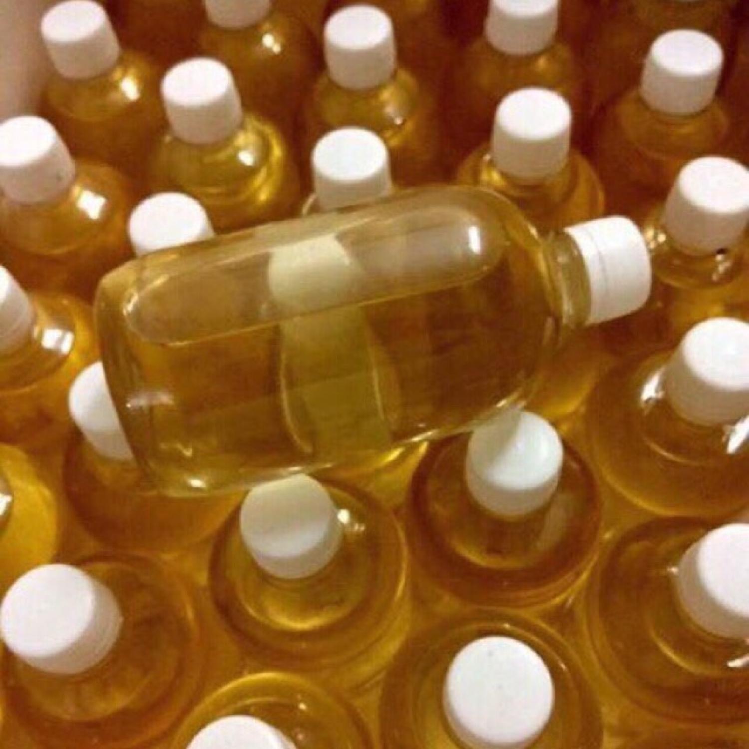 1 Liter of 2 Bottles of Fragrant, Handcrafted Coconut Oil.