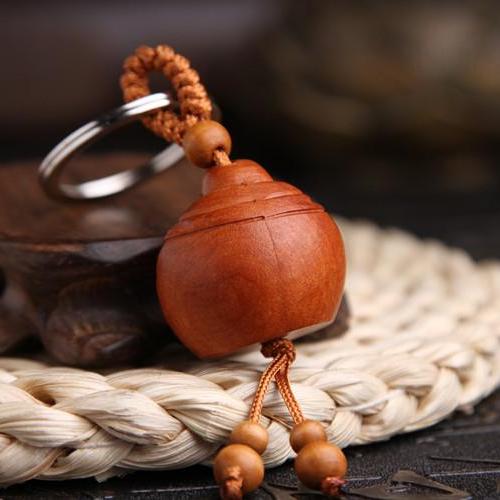 Móc Khóa Gỗ Thủ Công Khắc Hình Phật Di Lặc Bình An ( tròn )