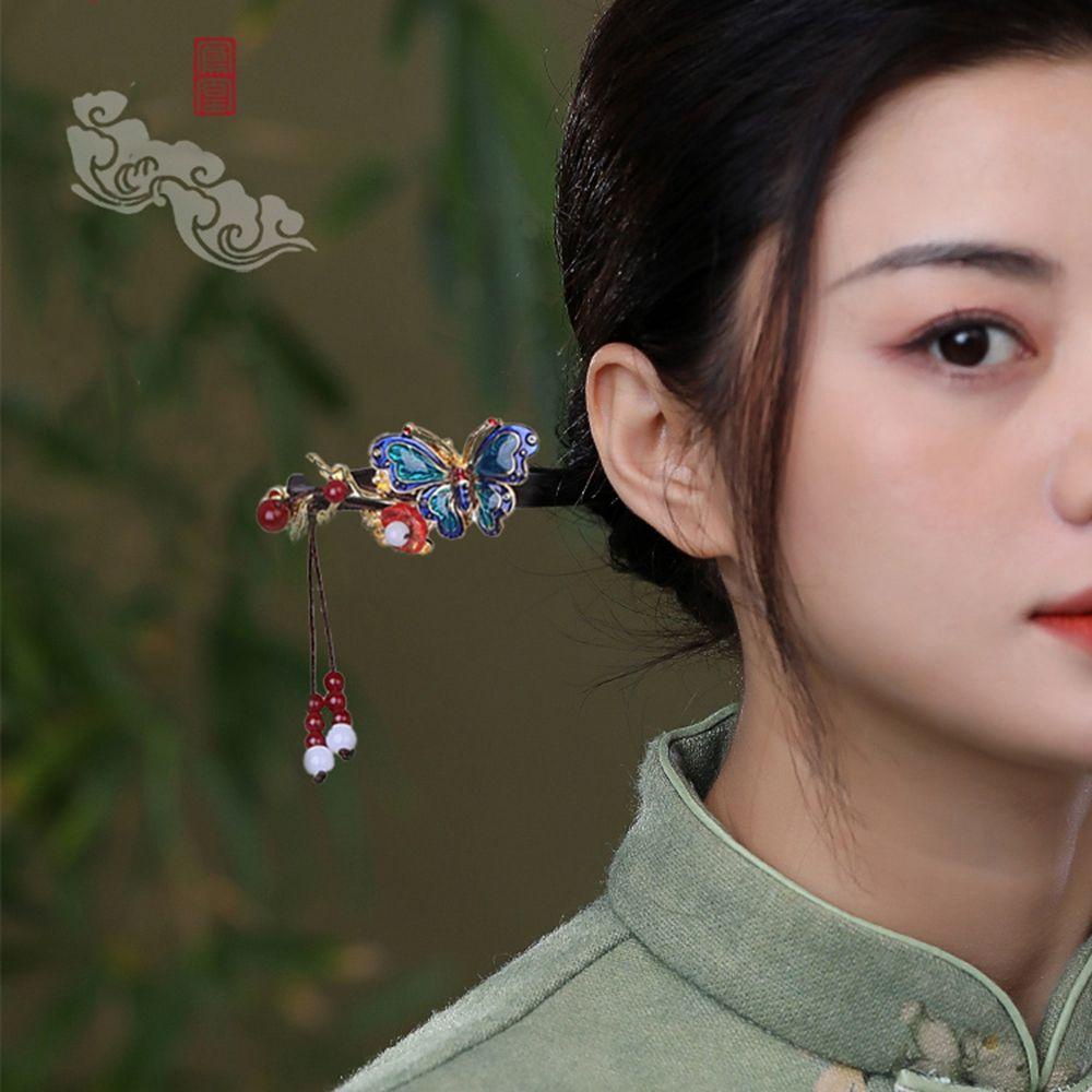 TRÂM BÚI TÓC CỔ PHONG GỖ