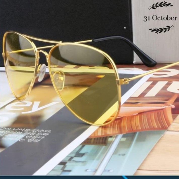 Kính đi ngày và đêm tròng kính màu vàng gọng tăm