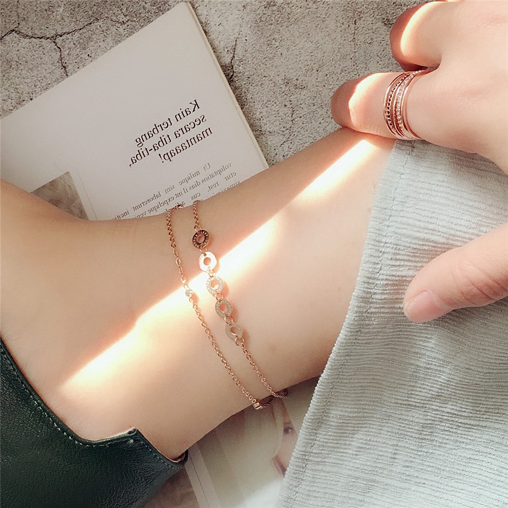 Lắc chân titan dãy vòng tròng khắc la mã cực sang trọng