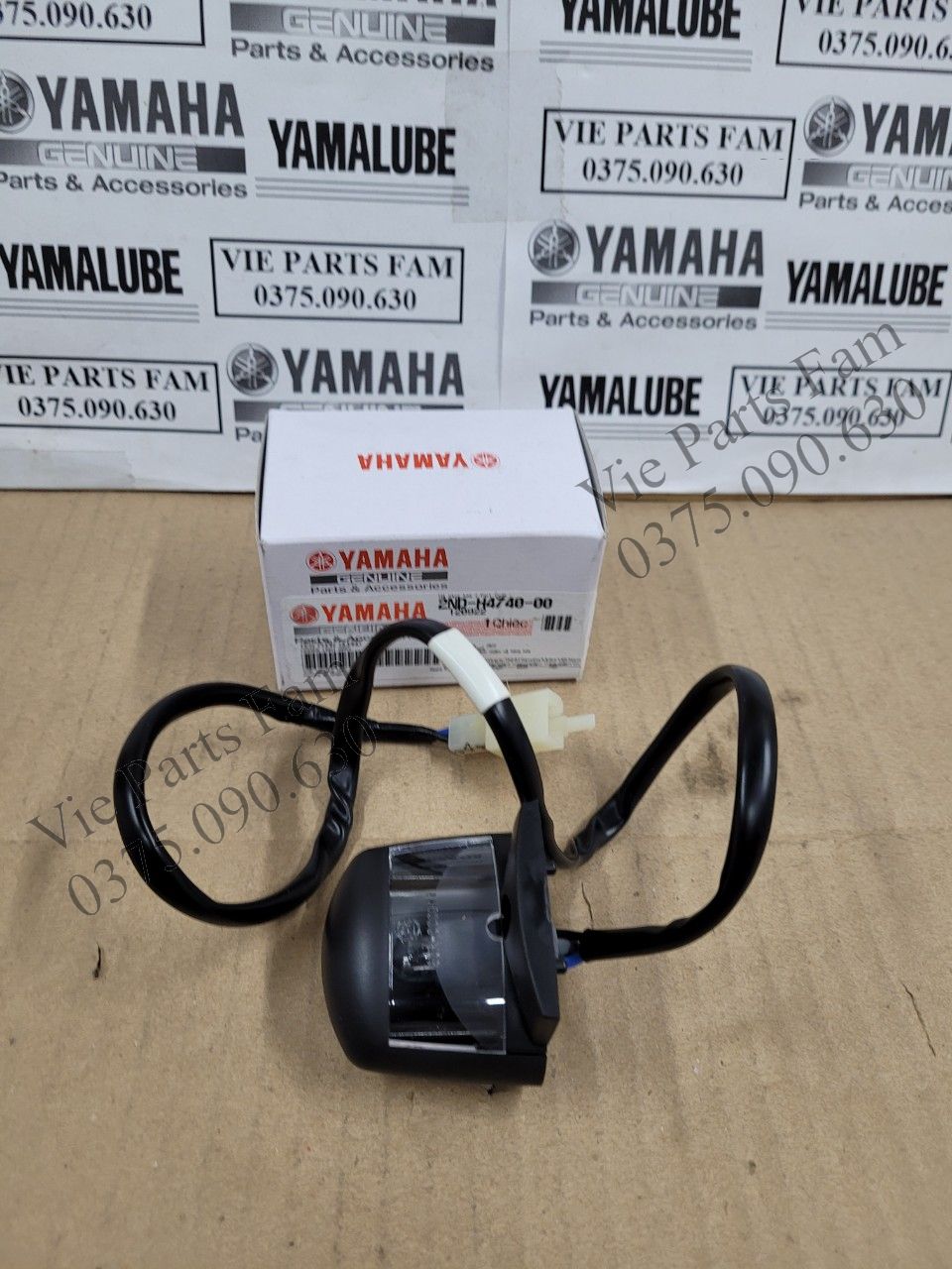 Đèn soi biển số Exciter 150, hàng din Yamaha mới 100%
