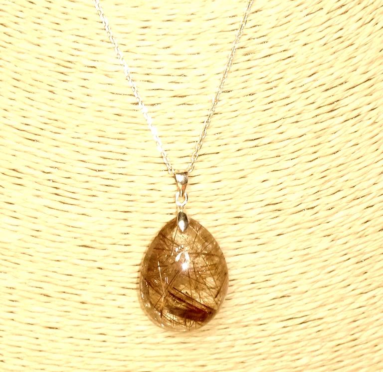MẶT DÂY CHUYỀN ĐÁ THẠCH ANH TÓC 29,6 CARAT(VÀNG NÂU)