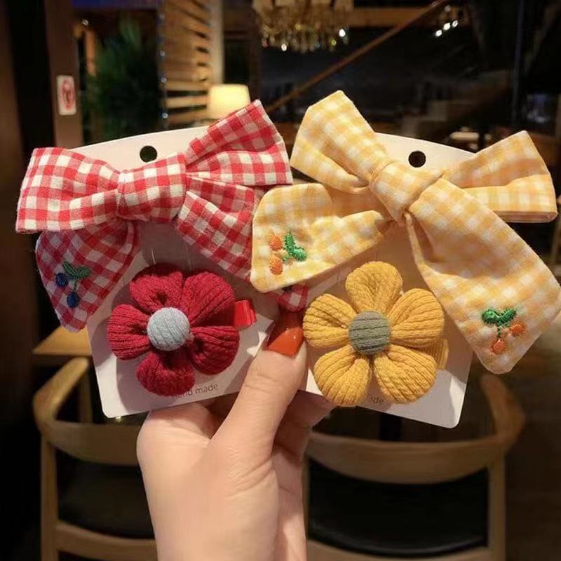 Sét 2 kẹp nơ và bông dễ thương cho bé gái