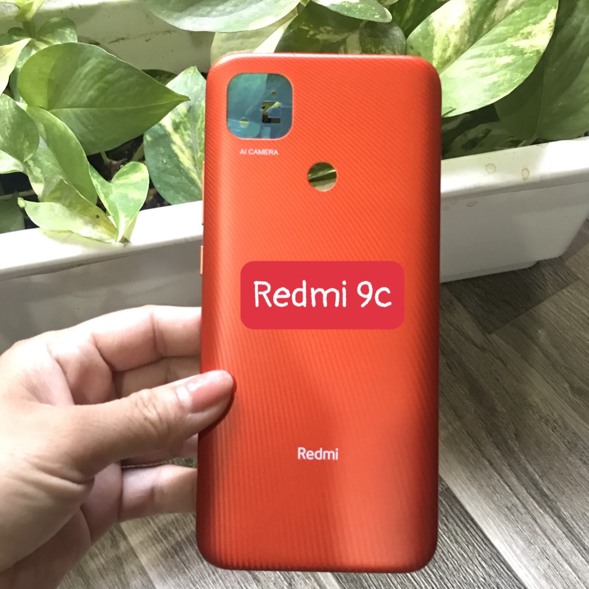 NắpLưng vỏ xiaomi Redmi 9c có cả cụm kính camera,nút bấm